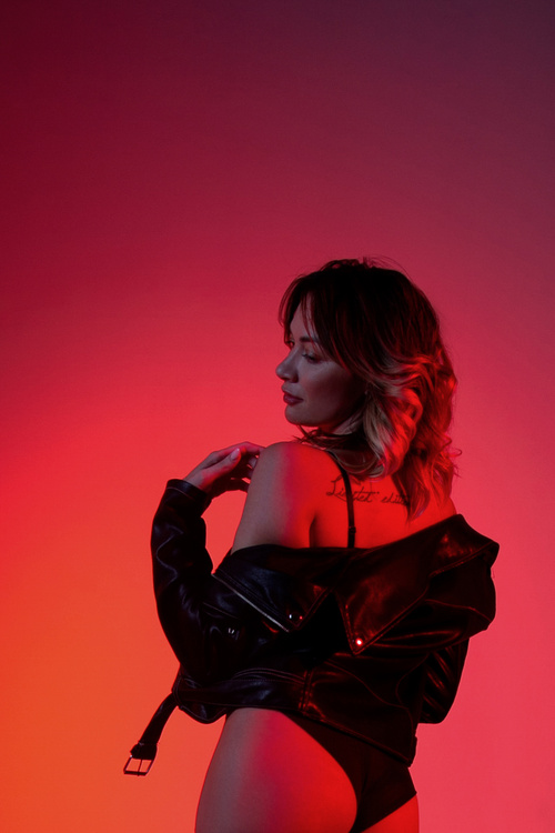 Sensual woman in lingerie and jacket